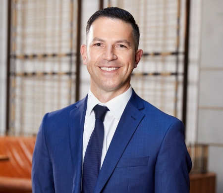 Louis Megas - Executive Director